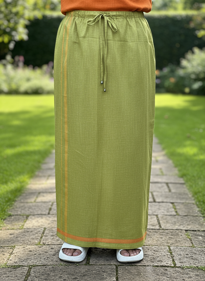 Light green pajamalungi with orange and yellow stripes for men's, shown in a garden setting.