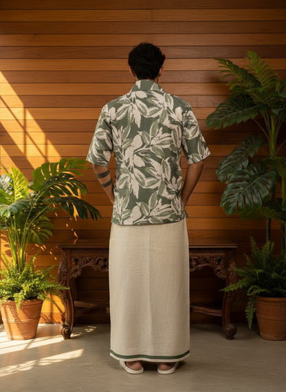 Olive light green big leaves digital print kurta with halfsleeves, back view, styled in a tropical setting.