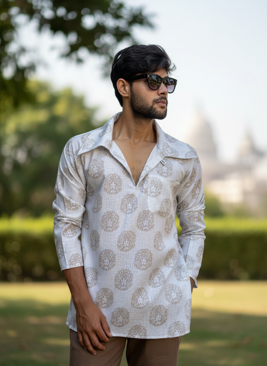 White Lion Face Printed Kurta with Big Neck Collar for Men’s worn by a man standing in lush garden.e Printed Kurta with Big Neck Collar for Men’s
