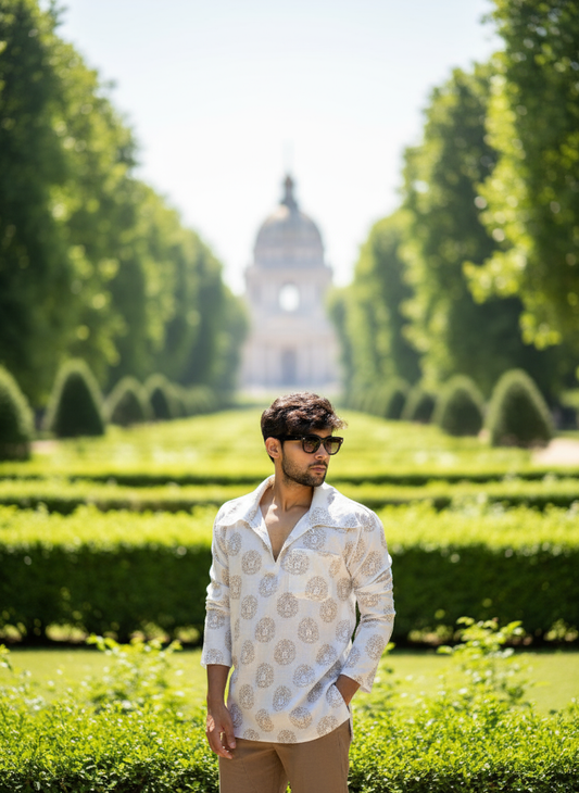 White Lion Face Printed Kurta with Big Neck Collar for Men’s worn by a man standing in lush garden.e Printed Kurta with Big Neck Collar for Men’s